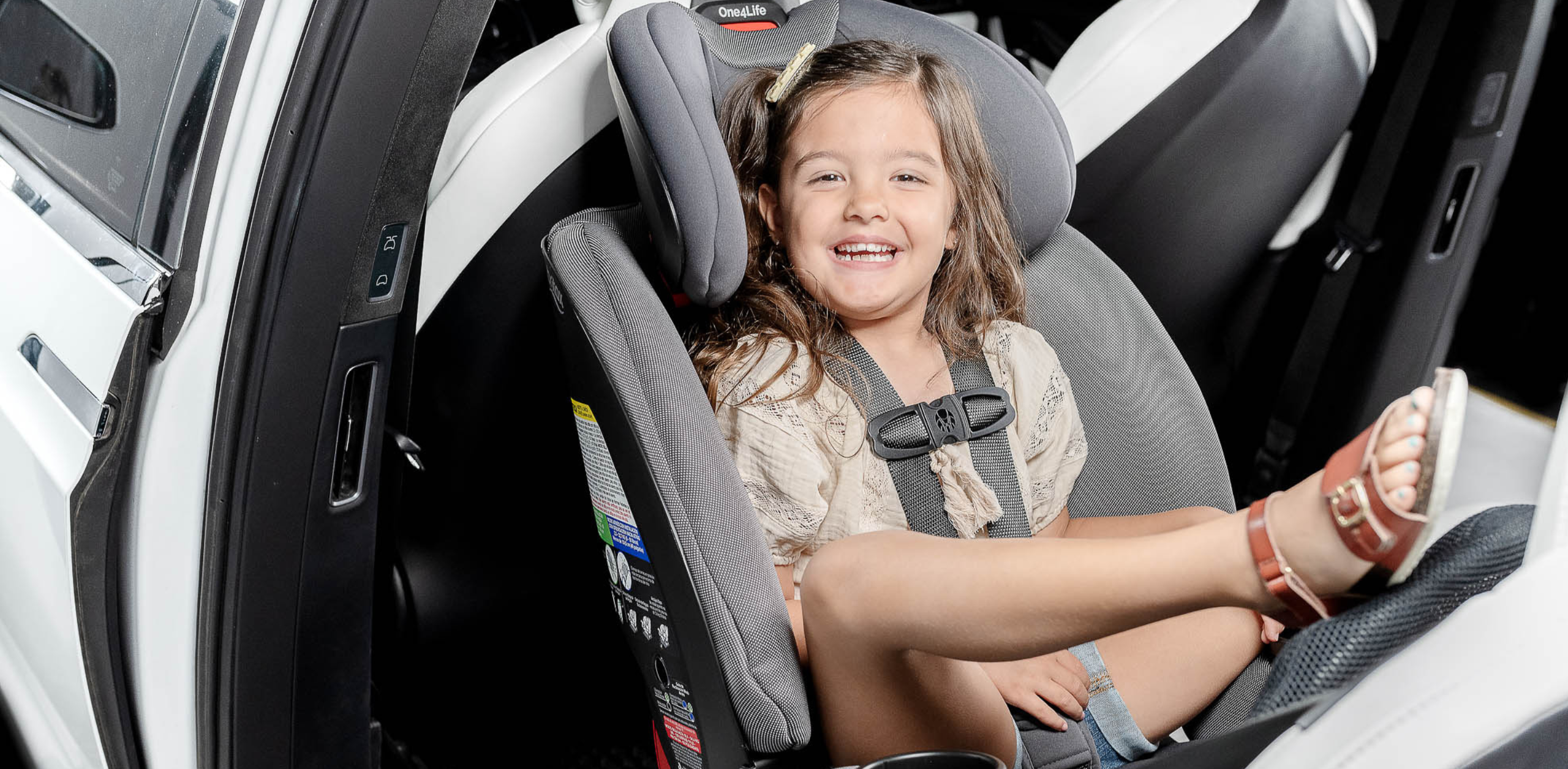 rear-facing girl | Rear-Facing Car Seat Myths