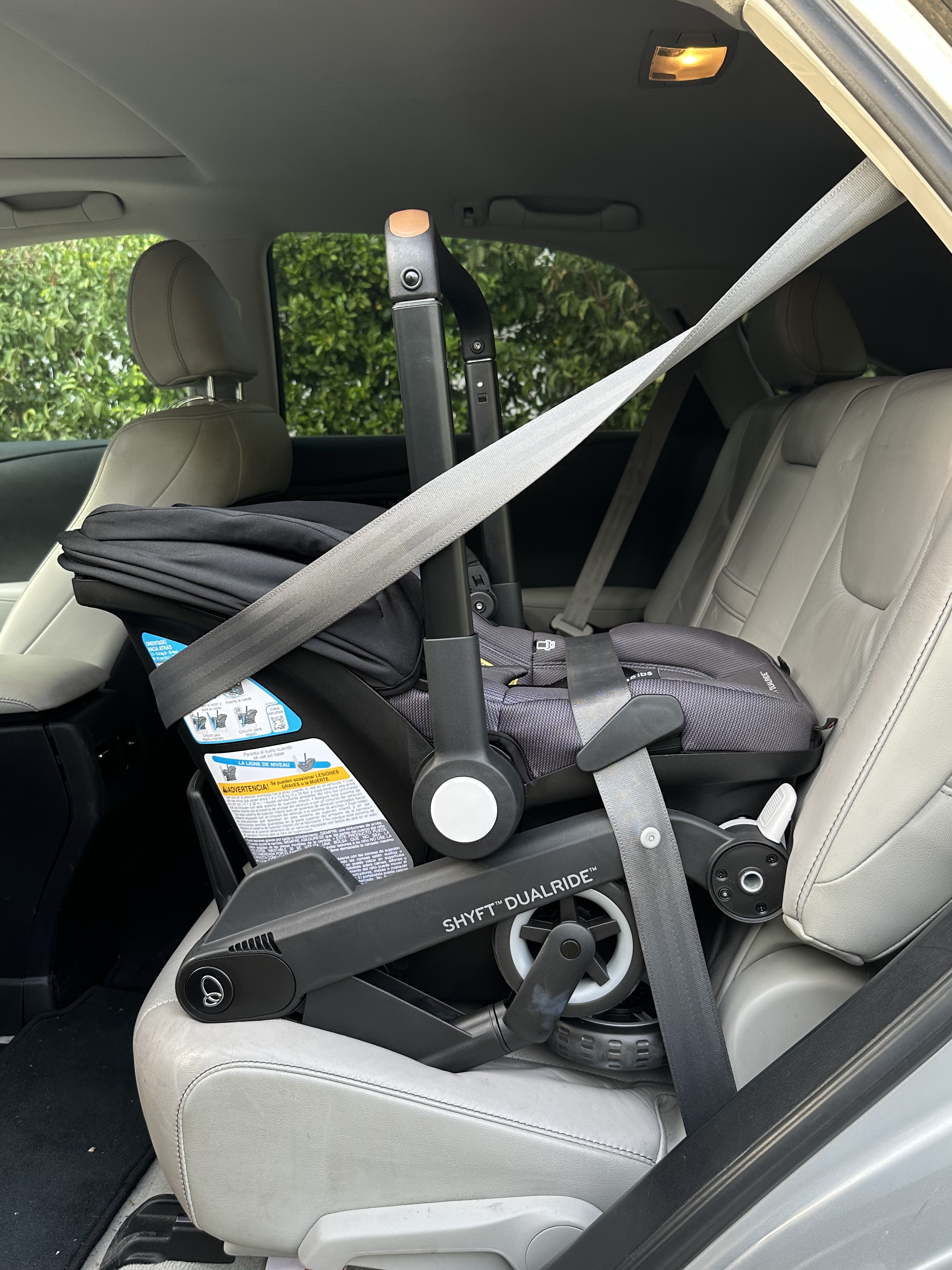 Evenflo Shyft DualRide Car Seat Review | Installed baseless with the wheels attached