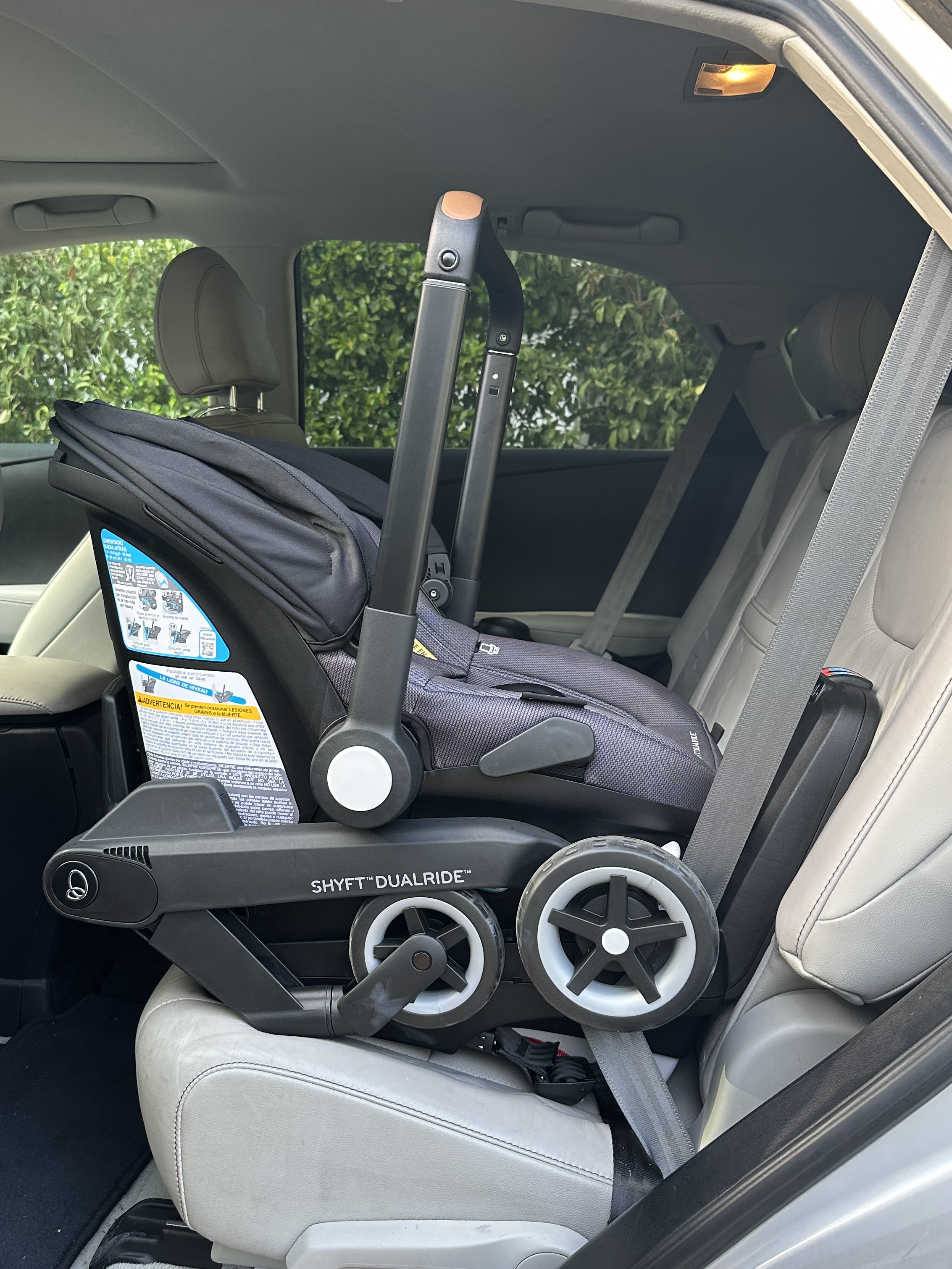 Evenflo Shyft DualRide Car Seat Review | Installed using the base with vehicle seat belt
